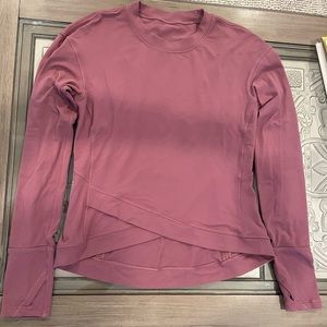 Lulu Lemon mauve top in a Medium.